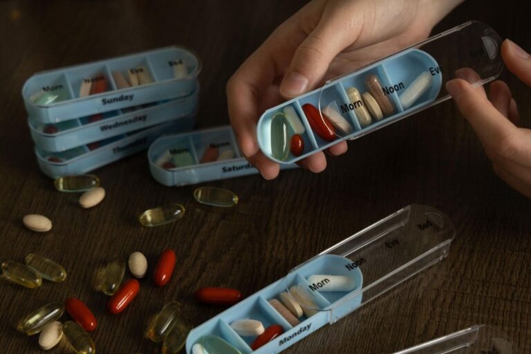 Weekly pill organizer with daily medication compartments for seniors